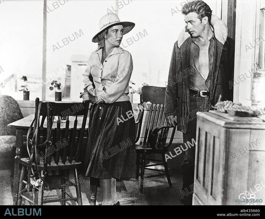 ELIZABETH TAYLOR und JAMES DEAN in GIANT, 1956, unter der Regie von GEORGE STEVENS. Copyright WARNER BROTHERS.