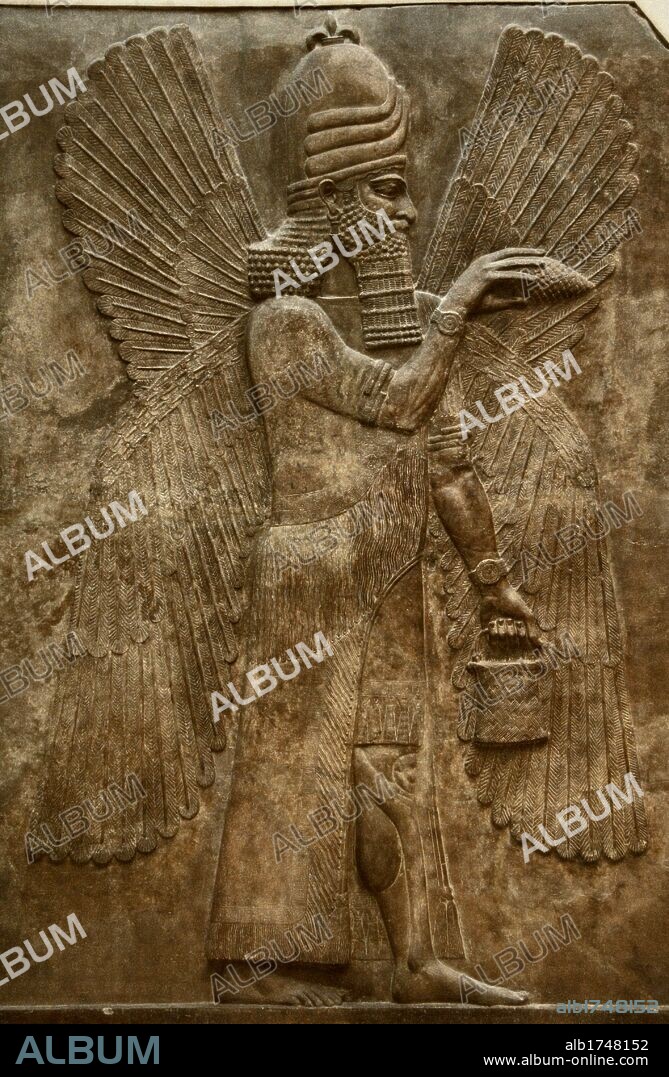 ARTE MESOPOTAMICO. ASIRIO. GENIO ALADO. Relieve del Paladio de Sargón II en Dur Sharrukin, antigua Asiria (Actual Khorsabad en Irak). 713-716 a. C. Fachada norte.713-706 a.C. (Siglo VIII a.C). Museo del Louvre. París. Francia.