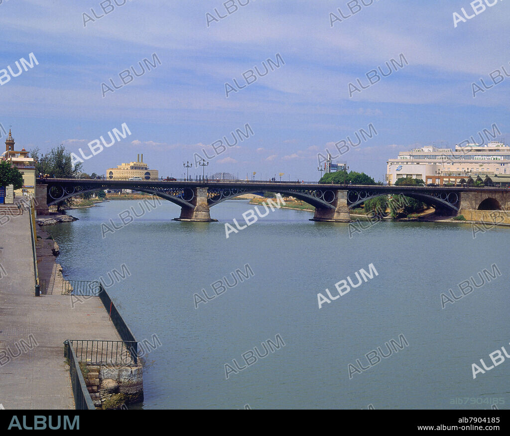 GUSTAVO STEINACHER Y FERDINAND BERNADET. PUENTE DE ISABEL II CONOCIDO POPULARMENTE COMO EL PUENTE DE TRIANA CONSTRUIDO ENTRE 1847 Y 1852.