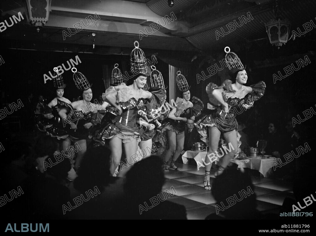 Bluebell Girls in Brussels. English Bluebell Girls performing at Boeuf sur le Toit, Brussels, Belgium. Lead by Molly Dexter age 20 followed by Mavis Wray age 20. 1951.