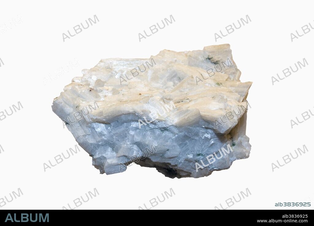 Wollastonite, a calcium silicate mineral, from Willsboro, New York, USA. Wollastonite is often fluorescent.