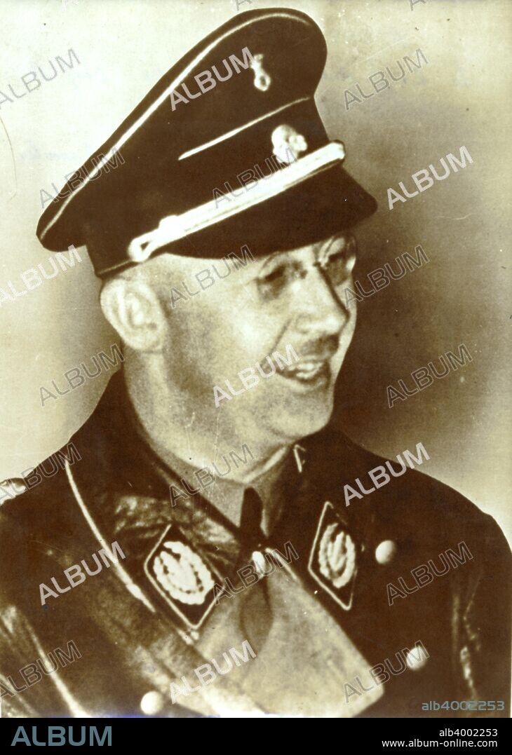 Heinrich Himmler in early SS uniform (black tie and cap) with the rank of Oberführer, 1933. Himmler (1900-1945) took part in Adolf Hitler's Beer Hall Putsch in Munich in 1923. He joined the SS in 1925, becoming its leader, or Reichsführer, in 1929. He went on to become one of the most powerful figures in the Nazi Party and was responsible for overseeing the organisation and administration of the Holocaust. In late April 1945 as the Second World War neared its end in Europe, Himmler went behind Hitler's back in an attempt to open negotiations with the Western Allies. When Hitler disovered this he stripped Himmler of all his offices and ordered his arrest. He tried to evade capture by disguising himself after the War ended, but was captured by the British on 22 May 1945. The following day, before he could be interrogated, Himmler committed suicide by biting a potassium cyanide capsule.