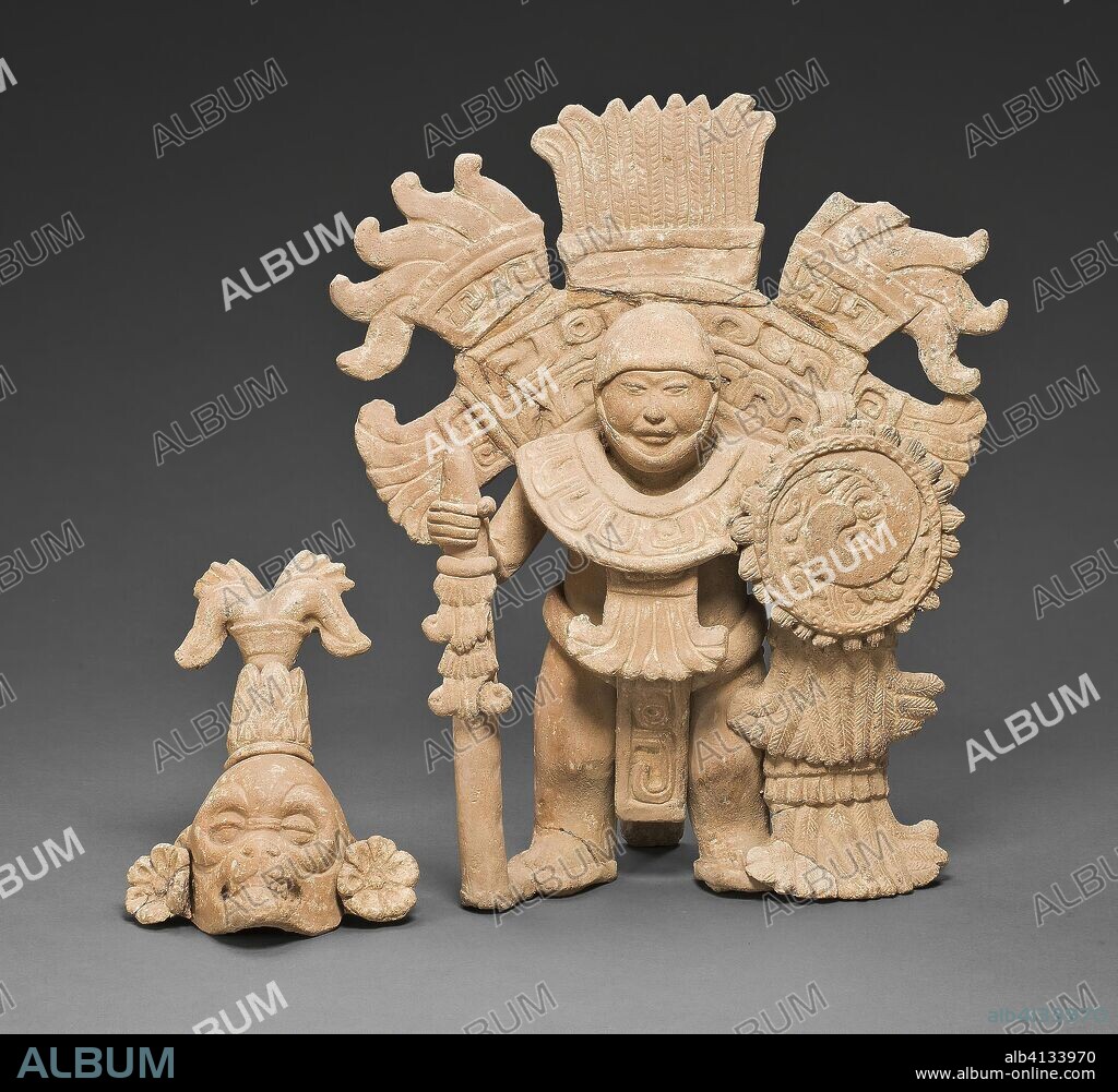 CLASSIC VERACRUZ. Standing Warrior Figure with Removable Mask and Headdress. Classic period Veracruz; Veracruz, Mexico. Date: 700 AD-1000. Dimensions: 31.4 x 25.7 x 11.3 cm (12 3/8 x 10 1/8 x 4 1/2 in.) [with headdress; h. 29.9 cm (11 3/4 in.) without headdress]. Ceramic and pigment. Origin: Veracruz state.