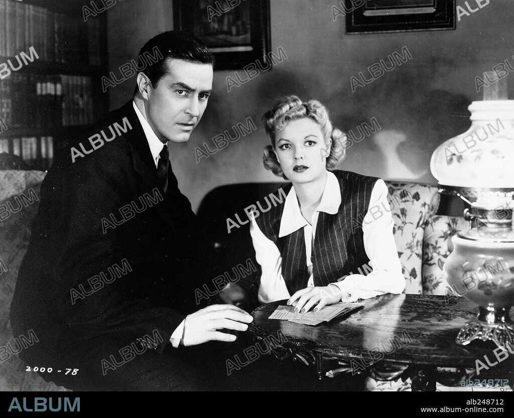 MARJORIE REYNOLDS and RAY MILLAND in MINISTRY OF FEAR, 1944, directed by FRITZ LANG. Copyright PARAMOUNT PICTURES.