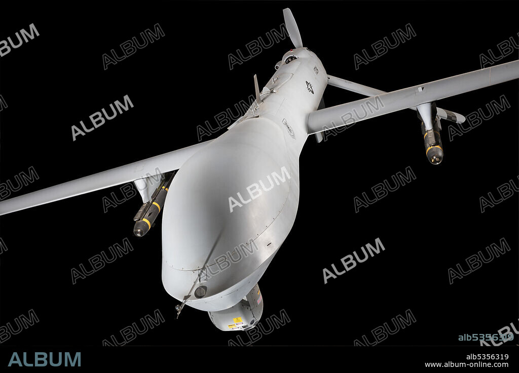 GENERAL ATOMICS. Satellite data link system, an Electro-optical/Infrared (EO/IR) stabilized gimbal containing two color video cameras and a forward looking infrared (FLIR) as well as synthetic aperture radar (SAR). The Predator can provide near real-time reconnaissance using a satellite data link system and perform attack missions as well. It served over the Balkans and Afghanistan and during Operation Iraqi Freedom in 2003. The most historic use of the Predator/Hellfire missile combination occurred when CIA ground forces directed attacks against al Qaeda forces during the opening months of the war on terrorism. This U.S. Air Force Predator was one of the first three UAVs to fly operational missions over Afghanistan after the 9/11 terrorist attacks. It went on to fly 196 combat missions in Afghanistan. It was also the first Predator to test fire the Hellfire missile, and the first UAV to fire Hellfire missiles in combat. With modifications to its wing length, propeller, avionics, and engine cooling system, it has served as the prototype for subsequent MQ-IL aircraft.