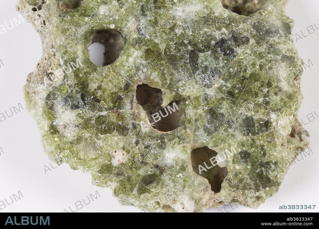 Trinitite, also known as atomsite or Alamogordo glass, is the glassy residue left on the desert floor after the plutonium-based Trinity nuclear bomb test on July 16, 1945, near Alamogordo, New Mexico. The glass is primarily composed of arkosic sand composed of quartz grains and feldspar that was melted by the atomic blast. Trinitite is mildly radioactive but is safe to handle for short periods of time.