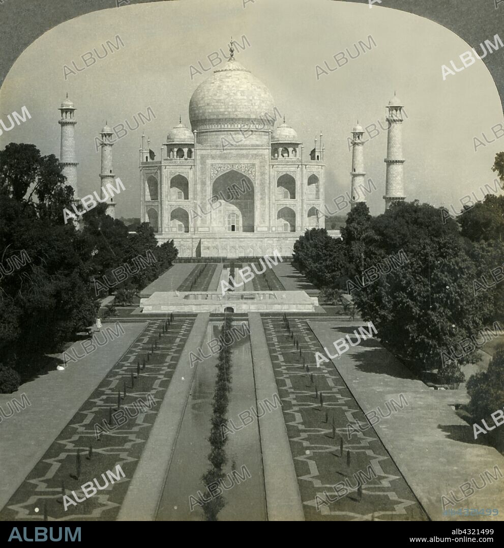 'The Taj Mahal, Agra, India', 1902. The great marble mausoleum built by Shah Jahan (1592-1666), Mughal emperor, for his wife Arjumand Banu Begam (died 1631) called Mumtaz Mahal (Favourite of the Palace). The Taj Mahal is considered to be one of the finest example of Mughal architecture, a style that combines elements of Indian and Persian architectures. Stereocard. [The Fine-Art Photographers' Publishing Co., London, 1902].