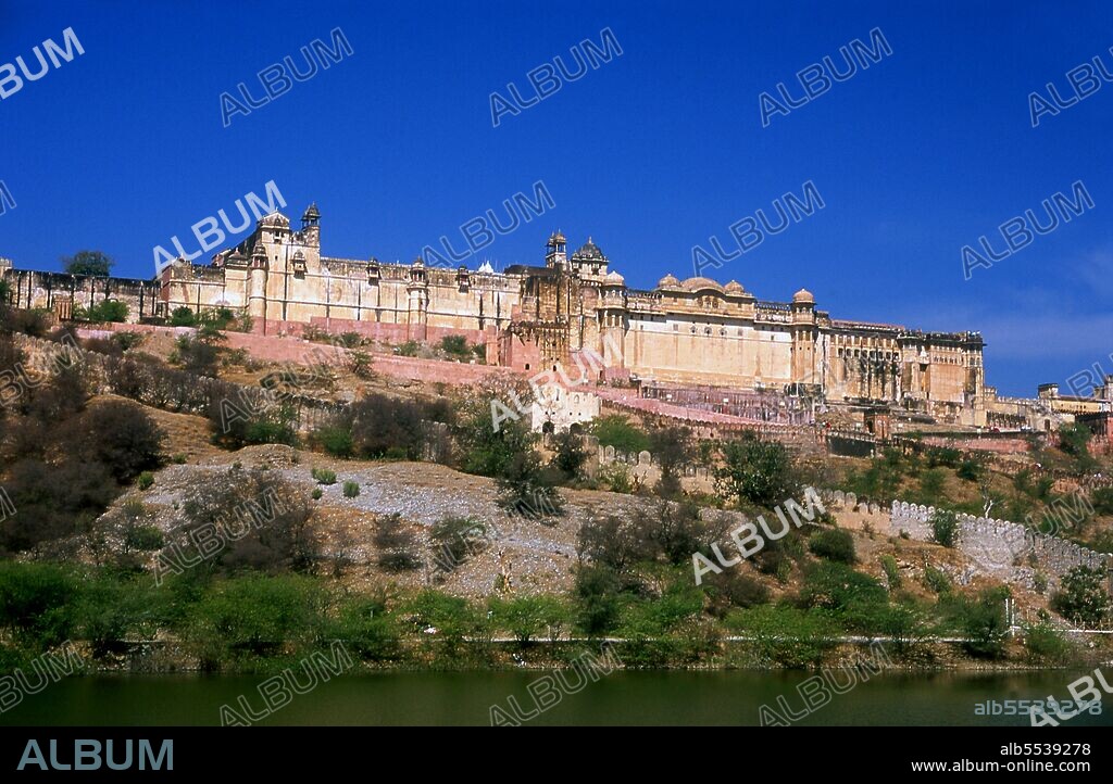 Amer Palace and Fort (Hindi: ???? ?????, also spelled and pronounced as Amber) was built by Raja Man Singh I  (December 21, 1550 – July 6, 1614). Jaipur is the capital and largest city of the Indian state of Rajasthan. It was founded on 18 November 1727 by Maharaja Sawai Jai Singh II, the ruler of Amber, after whom the city was named. The city today has a population of 3.1 million. Jaipur is known as the Pink City of India. The city is remarkable among pre-modern Indian cities for the width and regularity of its streets which are laid out into six sectors separated by broad streets 34 m (111 ft) wide. The urban quarters are further divided by networks of gridded streets. Five quarters wrap around the east, south, and west sides of a central palace quarter, with a sixth quarter immediately to the east. The Palace quarter encloses the sprawling Hawa Mahal palace complex, formal gardens, and a small lake. Nahargarh Fort, which was the residence of the King Sawai Jai Singh II, crowns the hill in the northwest corner of the old city. The observatory, Jantar Mantar, is a World Heritage Site.