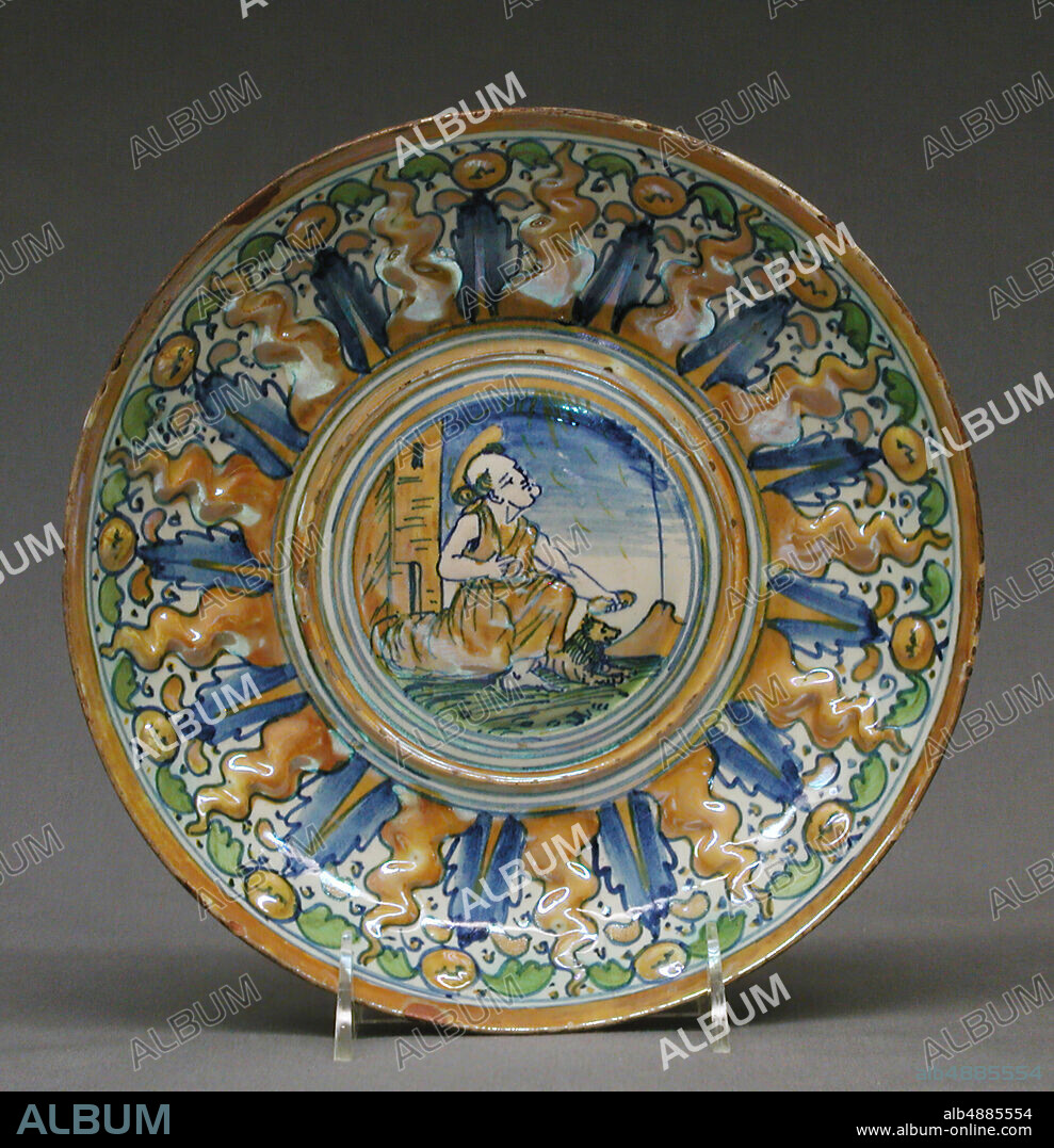 Bowl with St. Jerome and lion in a landscape, Italian, Gubbio, ca. 1530, Italian, Gubbio, Maiolica (tin-glazed earthenware), lustered, Overall, irregular diameter: 1 11/16 x 9 3/8 x 9 1/4 in. (4.3 x 23.8 x 23.5 cm), Ceramics-Pottery.