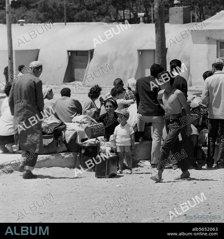 Jewish History:. Flight of the Jews from Algeria after the Algerian independence from France (formation of the Provisional Government of the Algerian Republic). Jews in a refugee camp in Marseille (France). Photo, 1962. From a series 'Accueil des refugiés juifs venant d'Alger'.