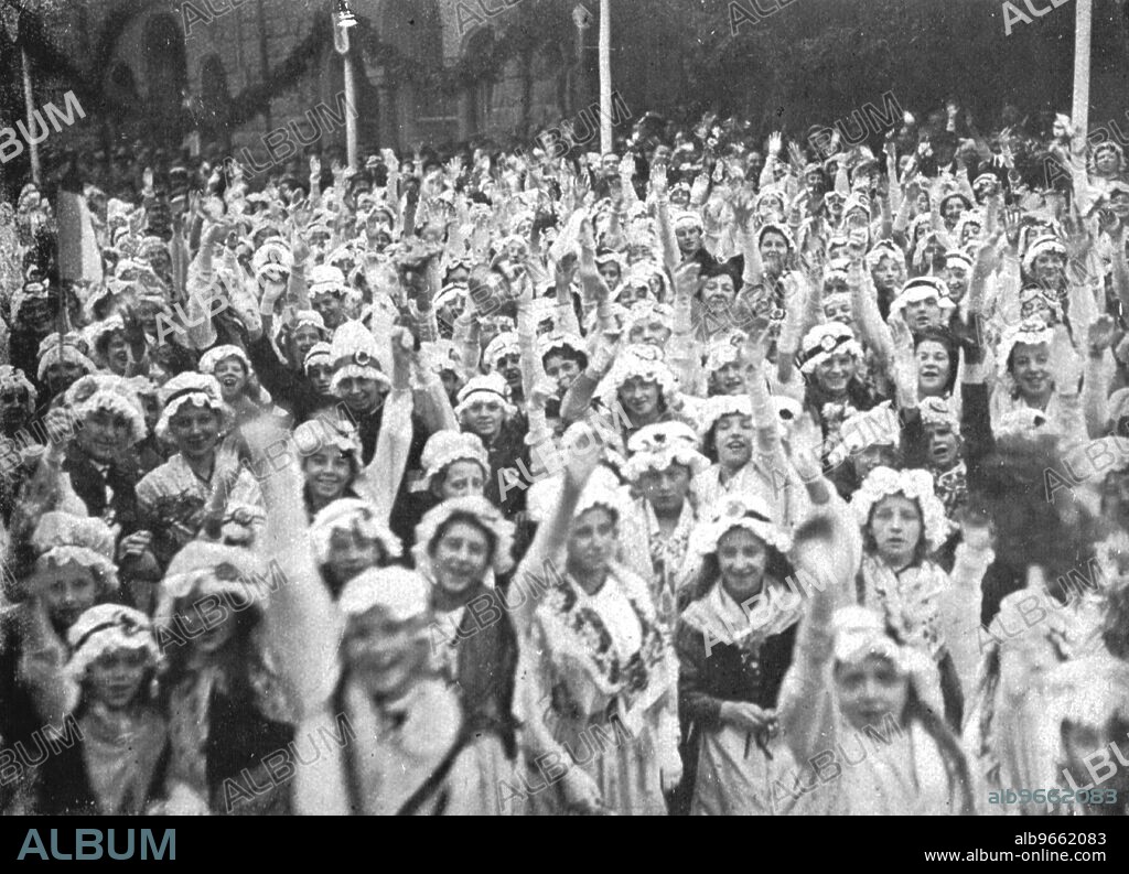 'Les fetes du 8 decembre 1918 a Metz; Les saluts et les vivats au president de la Republique et au president du Conseil, a leur sortie de la gare, le matin du 8 decembre', 1918. From "L'Album de la Guerre 1914-1919, Volume 2" [L'Illustration, Paris, 1924].