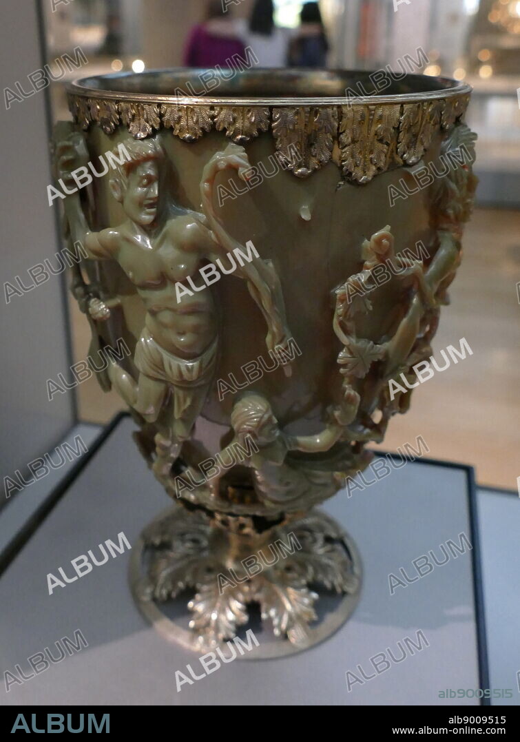 The Lycurgus Cup; 4th-century, Roman glass cage cup. Made of a dichroic glass, which shows a different colour depending on whether or not light is passing through it; red when lit from behind and green when lit from in front. It is the only complete Roman glass object made from this type of glass. The cup is also a very rare example of a complete Roman cage-cup, or diatretum. It named after King Lycurgus.