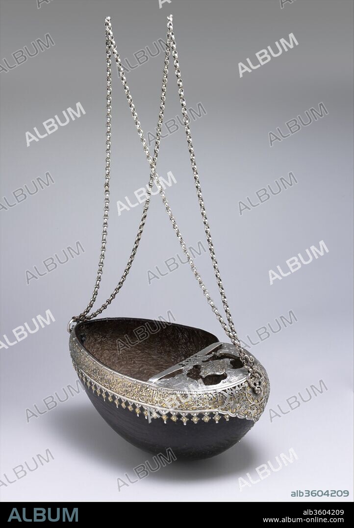 Begging Bowl. Dimensions: [Not including chain]
H. 5 1/2 in. (14 cm)
W. 12 1/8 in. (30.8 cm)
D. 6 9/16 in. (16.7 cm)
Wt. 31.1 oz. (881.8 cm). Maker: Yar Muhammad. Date: dated A.H. 1130/ A.D. 1717-18.