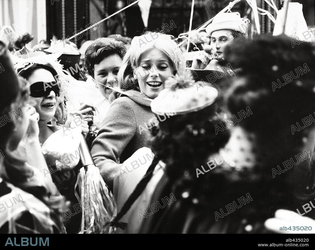 CATHERINE DENEUVE in THE UMBRELLAS OF CHERBOURG, 1964 (LES PARAPLUIES DE CHERBOURG), directed by JACQUES DEMY. Copyright PARC FILMS.