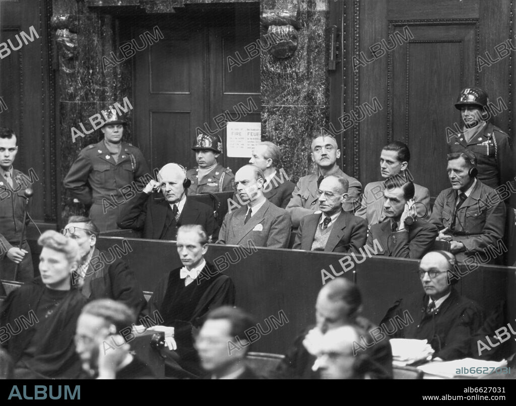 View on the dock on 20 December 1947: 1st row (l-r): Ernst von Weizsäcker, Gustav Adolf von Steengracht von Moyland, Wilhelm Keppler, and Ernst Wilhelm Bohle. 2nd row (l-r): Otto Dietrich, Gottlob Berger, Walter Schellenberg, and Lutz Schwerin von Krosigk. On 20 December 1947, the trial against 21 former diplomats and economic leaders of 'Wilhelmstraße' began at the grand court room of Nuremberg Palace of Justice. 20/12/1947