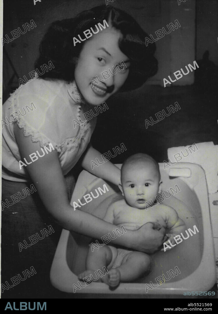 Mrs. Bruce Eden, of Prospect, Adelaide, was the first Japanese bride to have a baby in Australia. The baby has been called John Anthony, after his Australian grandfather.First Japanese war bride to have a baby in Australia, Mrs. Bruce Eden, bathes her four-month-old son, John Anthony, at their home in Prospect (Adelaide). This week Cherry Parker, first Japanese war bride to come to Australia, had a son, Harry, in Melbourne. Both children are named after their Australian grandfathers. January 08, 1953.