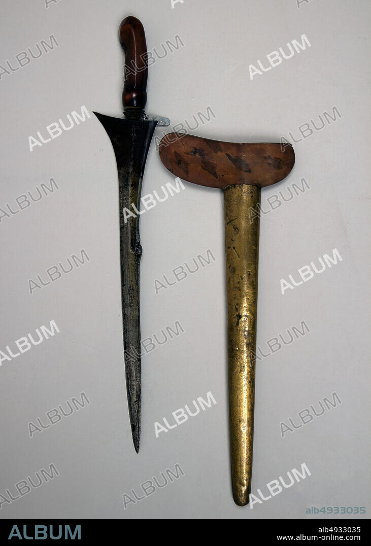 Kris with Sheath, Javanese, 16th19th century, Jawa, Javanese, Kajoe pelet, brass, L. with sheath 17 1/2 in. (44.5 cm); L. without sheath 16 1/2 in. (41.9 cm); L. of blade 13 in. (33 cm); W. 3 1/2 in. (8.9 cm); Wt. 6.9 oz. (195.6 g); Wt. of sheath 3.7 oz. (104.9 g), Krisses.