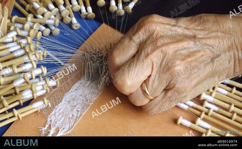 Lace making in Bruges, 2014. The intricate lace patterns in Belgium are unmatched in any other country. The lace trade rose during the early Renaissance. Emperor Charles V decreed that lace-making should be a compulsory skill for girls in convents and beguines throughout Flanders. Lace became fashionable on collars and cuffs for both sexes. Trade reached a peak in the 18th century. Lace makers are traditionally women. Hundreds of craftswomen still work in Bruges and Brussels, centres of bobbin lace, creating intricate work by hand, often using over 100 threads per bobbin.