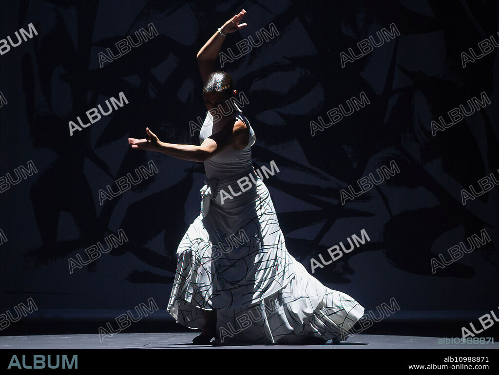 June 13, 2024, Malaga, Spain: Spanish flamenco dancer Sara Baras, dances on the stage during her new performance 'Vuela', at Cervantes Theatre in Malaga. Renowned Spanish flamenco dancer Sara Baras celebrates the 25th anniversary of her company dance with a new performance 'Vuela' (Fly), a tribute to Spanish guitarist Paco de Lucia. The choreography, created by Sara Baras, is divided into four acts ('Madera' (Wood), 'Mar' (Sea), 'Muerte' (Death) and 'Volar' (Fly)) and has as its main narrative the use of words and movement on stage. (Credit Image: © Jesus Merida/SOPA Images via ZUMA Press Wire).