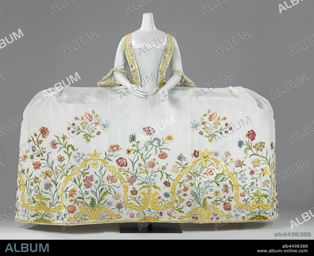 Dress (Mantua) with Train Wedding gown made of light blue ripped silk embroidered with a floral motif in multicolored silk, consisting of a body with 'tail', skirt and train, Wedding gown made of light blue ripped silk embroidered with a floral motif in multicolored silk, consisting of a body with 'tail' (a), skirt (b) and a drag (c). Model: 'Grande Parure'. Was worn over a very wide hoop skirt, 'panier à coudes'. Skirt consists of eight lanes and has a hem that has been folded inwards of 1.5 cm, which is fixed with large and small basting stitches. Linen inner body and at the waist a linen ribbon for closure around the waist. Sleeves lined with linen. The rib side of the body is cut off and not finished. At the center of the back of the neck is an elongated insert made of ribbed silk. The body with 'tail' is made up of two long straight strips, which depend from the shoulders forwards to the waist and from the back to the 'tail'. On the back, they are connected to each other by a seam at the back of the middle and fitted with two flat pleats on either side of the seam. Regence, flowers, ornament, The Hague, Helena Slicher, anonymous, Nederlanden, c. 1750 - c. 1760, japon, voering, embroidering, w 60 cm h 65 cm w 96 cm l 30 cm.