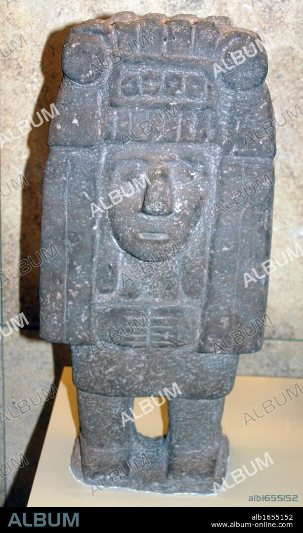 Standing figure of Chicomecoatl female deity associated with Maize and food. Aztec 1300-1521 AD. Pre-Columbian Mesoamerican Mythology. Sculpture.
