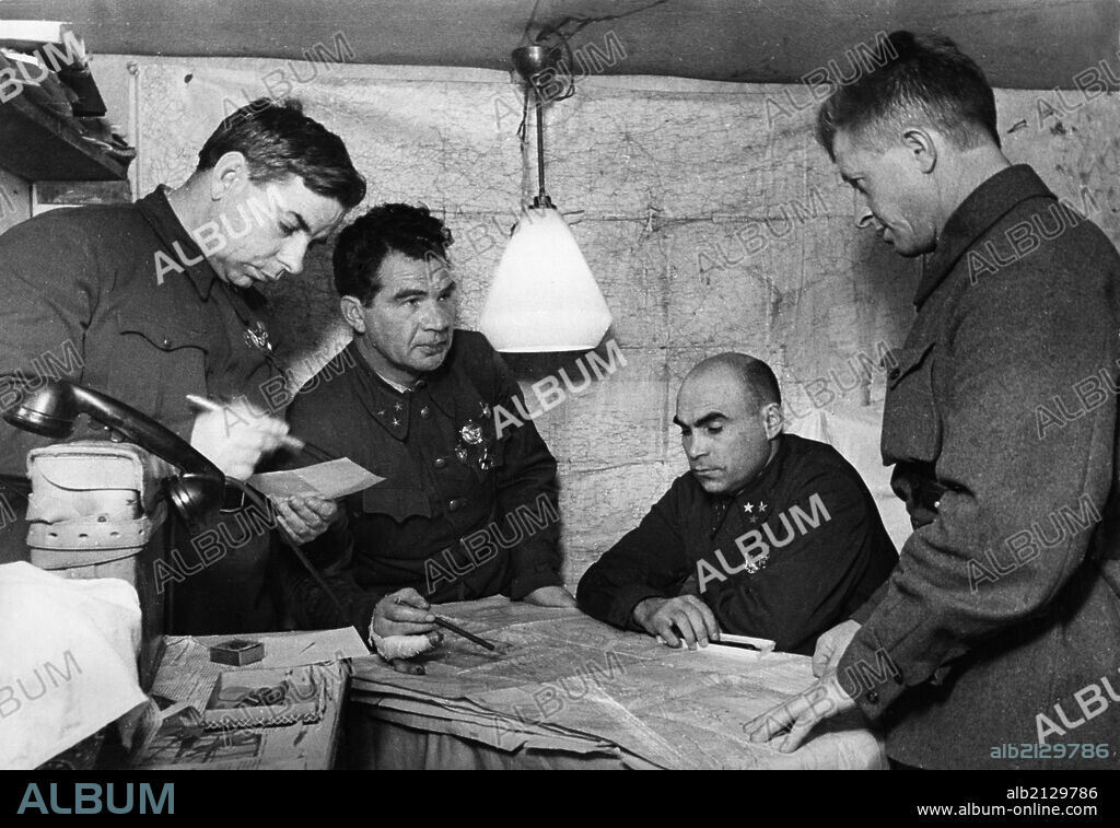 Lt, general vasili chuikov (2nd from left) giving an assignment to the commander of the 13th guards rifle division, major general alexander rodimtsev (far right), in the command post bunker of the 62nd army in november 1942, stalingrad, also present are major general n, i, krylov (far left) and member of the military council, lt, general k, a, gurov (2nd from right) . 01/02/2013