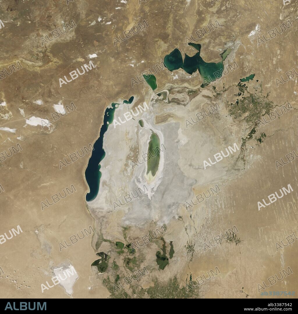 Satellite image of the shrinking of the Aral Sea taken in 2016. The Aral Sea, is a lake lying between Kazakhstan, in the north and Uzbekistan in the south. The name roughly translates as 'Sea of Islands', referring to over 1,100 islands that once dotted its waters; Formerly one of the four largest lakes in the world with an area of 68,000 km2 (26,300 sq mi), the Aral Sea has been steadily shrinking since the 1960s after the rivers that fed it were diverted by Soviet irrigation projects.