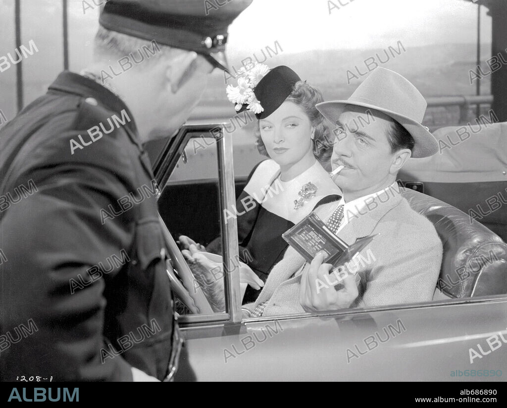 MYRNA LOY and WILLIAM POWELL in SHADOW OF THE THIN MAN, 1941, directed by W. S. VAN DYKE. Copyright M.G.M.