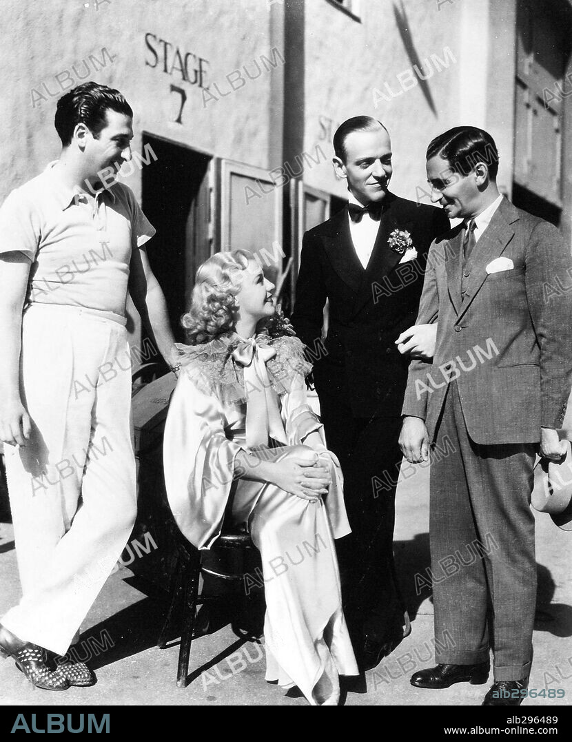 FRED ASTAIRE, GINGER ROGERS, IRVING BERLIN and MARK SANDRICH in TOP HAT, 1935, directed by MARK SANDRICH. Copyright RKO.