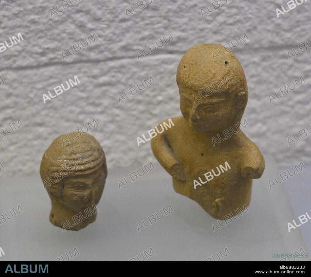Statuette and head of the goddess Astarte, from Tell Beit Mirsim. 1200-800 BC. Earthenware. Sephardic Museum. Toledo. Castile-La Mancha. Spain.