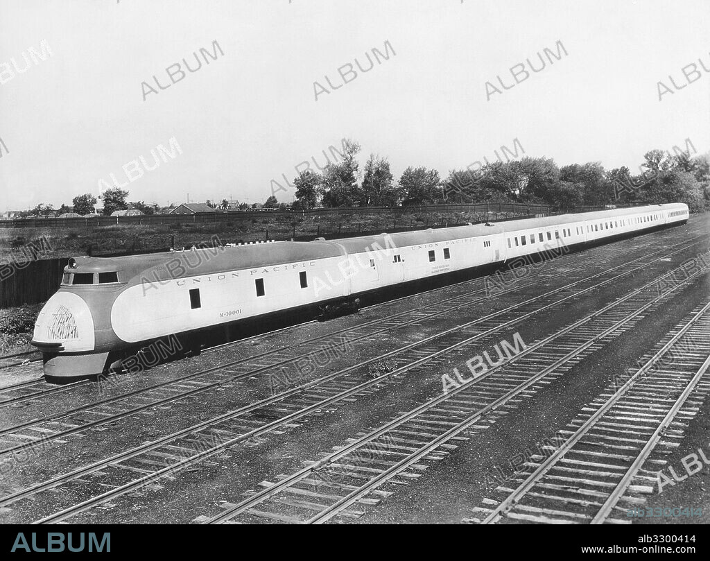 United States:  c. 1934.Union Pacific Railroad's new diesel-electric streamliner train M-10001 with a Railway Post Office car, three Pullman cars and coach/buffet/observation car. It still holds the record time for Los Angeles to New York of 57 hours. It became the City of Portland train.