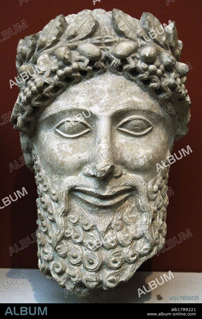Head from a statue of a bearded man with laurel wreath. Probably an priest. Limestone. Sculpted in Cyprus between 475-450 BC. From the Sanctuary of Apollo at Idalion. British Museum. London. England. United Kingdom.