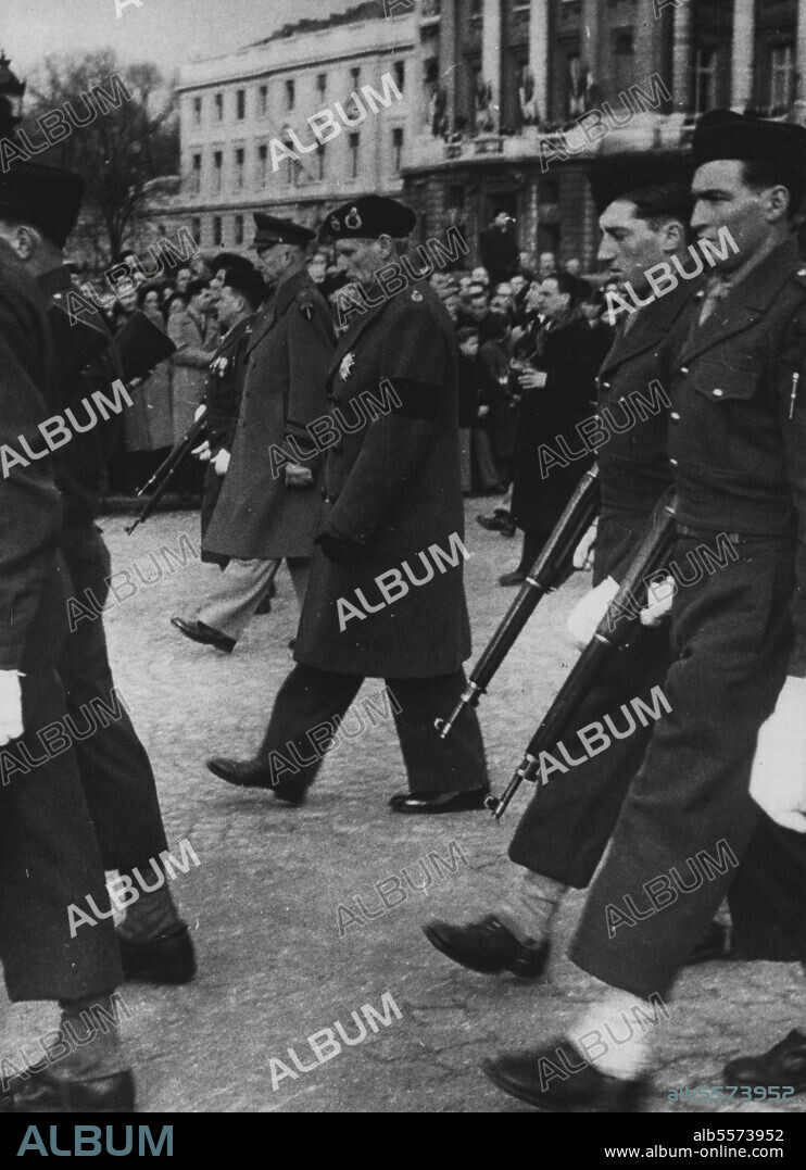 Funeral Of Marshal De Tassigny -- General Eisenhower (far side) and Field Marshall Lord Montgomery walking in procession during the funeral of Marshall de Latter de Tassigny in Paris yesterday. January 29, 1952.
