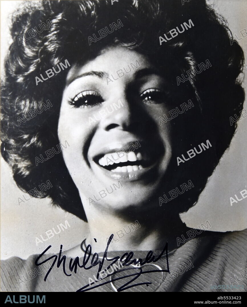 Dame Shirley Veronica Bassey, (born 1937) Welsh singer. Well-known for her expressive voice and for recording the soundtrack theme songs of the James Bond films Goldfinger (1964), Diamonds Are Forever (1971), and Moonraker (1979) signed photograph 1980.