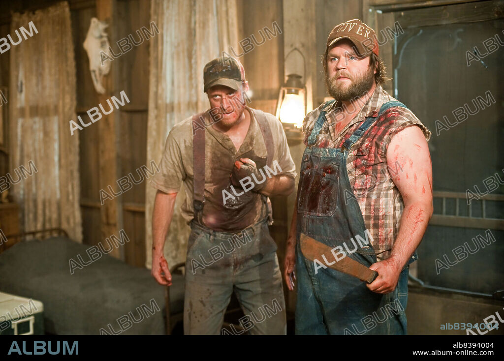 ALAN TUDYK and TYLER LABINE in TUCKER AND DALE VS EVIL, 2010, directed by ELI CRAIG. Copyright EDEN ROCK MEDIA/LOOBY LOU/RELIANCE MOTION PICTU/URBAN ISLAND.
