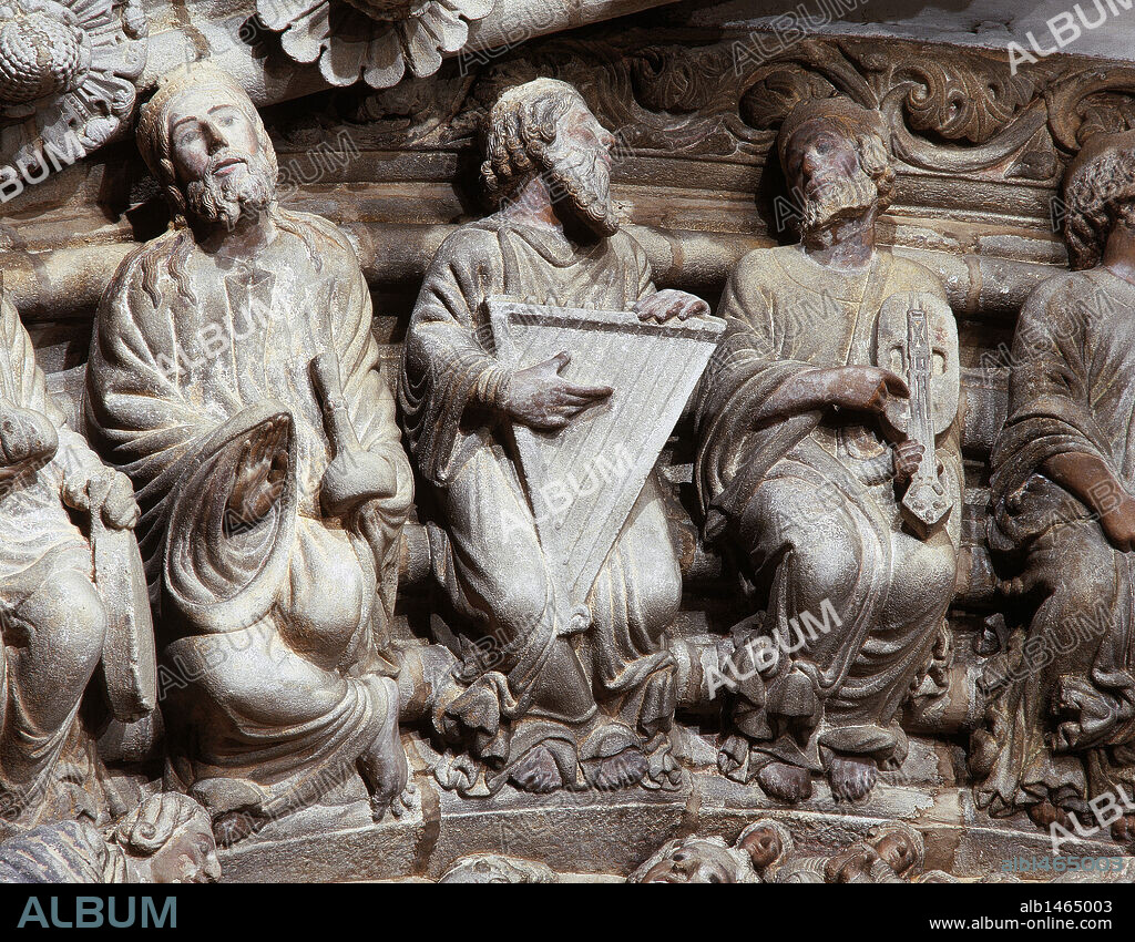 Santiago de Compostela Cathedral. The Portal of Glory. Romanesque style, by Master Mateo, 1168-1188. Central archivolt., detail. 24 Elders of the Apocalypse. Each one is holding a musical instrument. From right to left: Elderly holding a redoma or flask (perfume bottle), harp-psaltery and oval viola. Province of La Corun_a, Galicia, Spain.