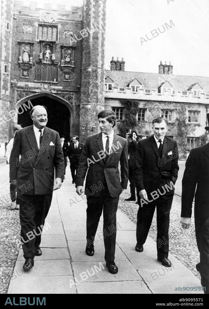 '8th October 1967: Prince Charles arrives at Cambridge. He is 19 yrs old next month. He walks across the quadrangle at Cambridge yesterday, with Lord Butler and Head Tutor, Dr. Denis Marrian.'.