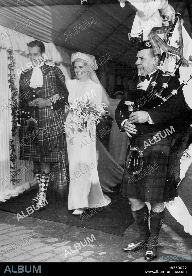 Duke's Son Weds Health Leader In Glasgow Cathedral -- Lord David Douglas Hamilton, youngest son of the Duke of Hamilton, was yesterday married in Glasgow Cathedral to Miss Prunella Stack, leader of the Women's League of Health and Beauty. A thousand guests attended the ceremony, and about 20,000 spectators thronged the Cathedral. October 16, 1938. (Photo by Keystone Press Agency Ltd.).