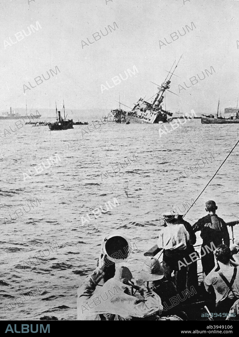 'The Majestic sinking after being torpedoed by an enemy submarine', 1915. HMS Majestic was a Majestic-class pre-dreadnought battleship of the Royal Navy. On 27 May 1915, she was torpedoed by a U-boat at Cape Helles, sinking with the loss of 49 men. From The Manchester Guardian History of the War Vol. III - 1915.. [John Heywood Ltd, London, 1915].