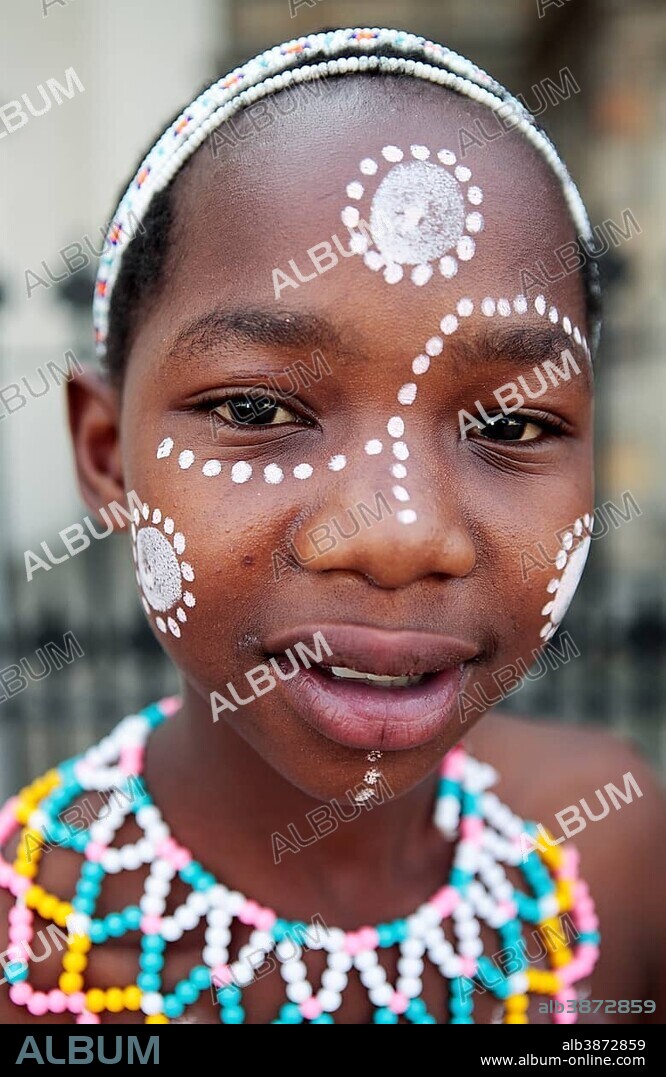 Portrait of Xhosa girl with traditional adornment, Grahamstown, Eastern Cape, South Africa, Africa.