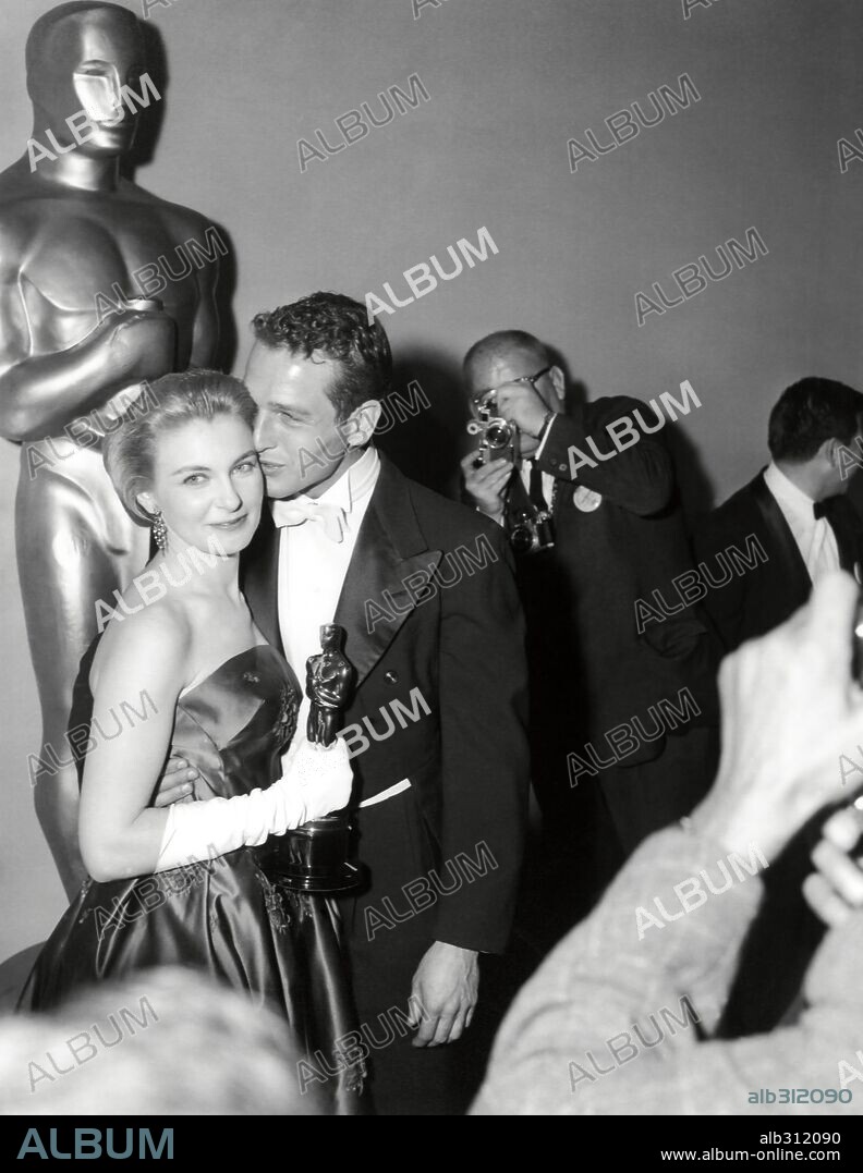 JOANNE WOODWARD and PAUL NEWMAN. 30th Academy Awards (1957). Joanne Woodward, best actress for "The Three Faces of Eve". Paul Newman accompanies her. 1958
