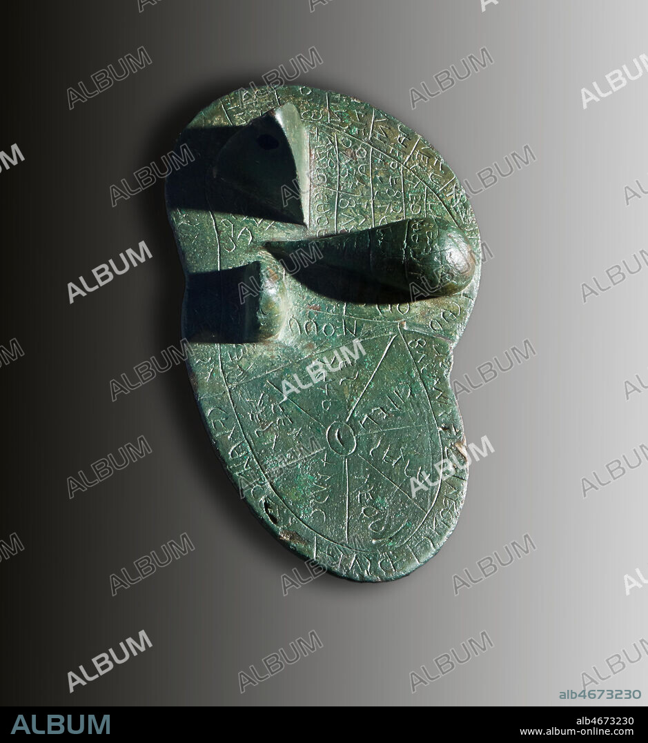 Piacenza, Palazzo Farnese, Municipal Museums: Etruscan Liver. The Liver of Piacenza is an Etruscan artifact found in 1877, near Gossolengo, in the province of Piacenza. It is a life-sized bronze model of a sheep's liver covered in Etruscan inscriptions (TLE 719), measuring 126 mm by 76 mm by 60 mm and dated to the late 2nd century BC, i.e. a time when the Piacenza region would already have been Latin-dominated.. The liver is subdivided into sections for the purposes of performing haruspicy (hepatoscopy). The outer rim of the Piacenza liver is divided into 16 sections; since according to the testimony of Pliny and Cicero, the Etruscan divided the heavens into 16 astrological houses, it has been suggested that the liver is supposed to represent a model of the cosmos, and its parts should be identified as constellations or astrological signs.