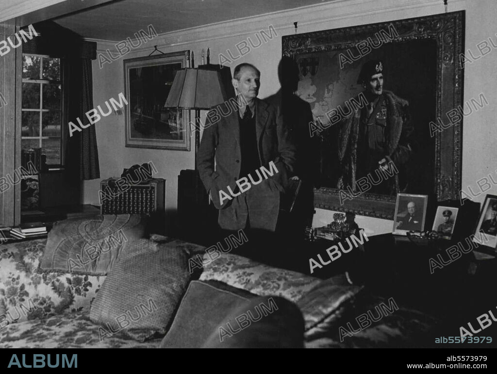 At Home With "Monty" - Field Marshal Viscount Montgomery of El Alame in photographed at home in his new residence at Islington Mill, near Farnham, Hampshire. The new chairman of the Western commanders-in-chief's committee has treasured pictures around him in his home, portraits of his Majesty the King, Mr. Winston Churchill and South Africa's general Smuts standing upon his table, while the famous Frank O. Salisbury painting of "Monty" himself hangs upon the wall. In the spirit in which he faced the future at the famed battle of El Alamein, the sixth anniversary of which falls the troubled World of today. October 17, 1948. (Photo by Pix Photos).