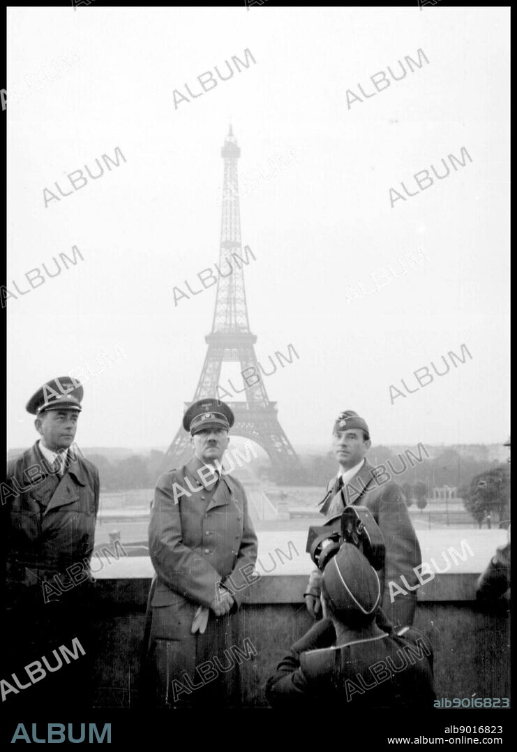 Photograph of Adolf Hitler in Paris, with the Eiffel Tower in the background. Dated 1940.