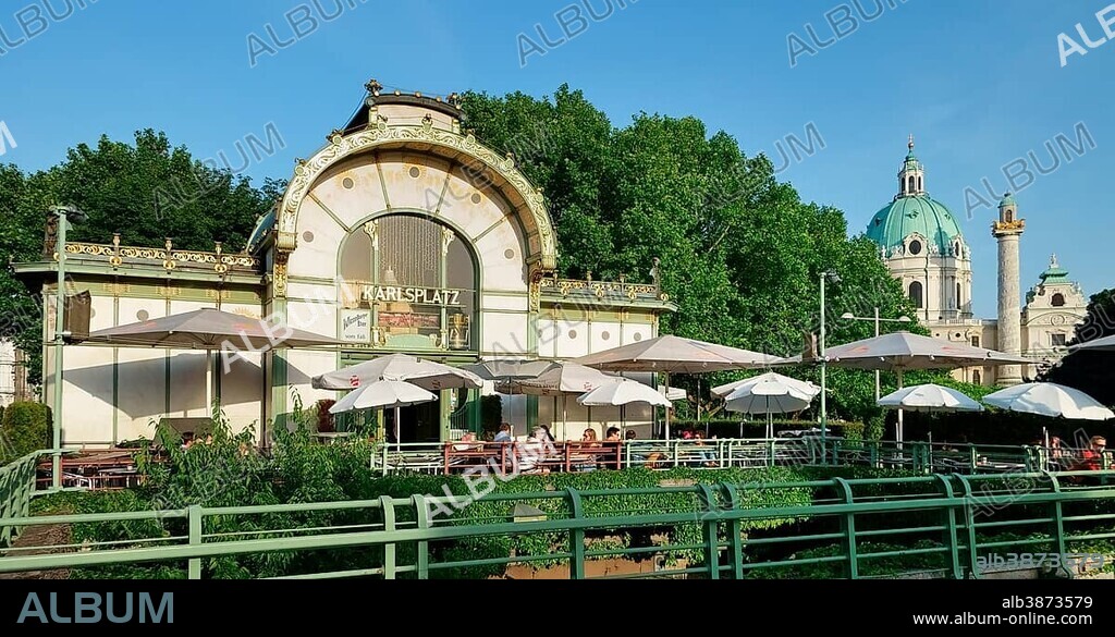 Art Nouveau-style café by architect Otto Wagner, Karlskirche church at the back, Karlsplatz square, Vienna, Austria