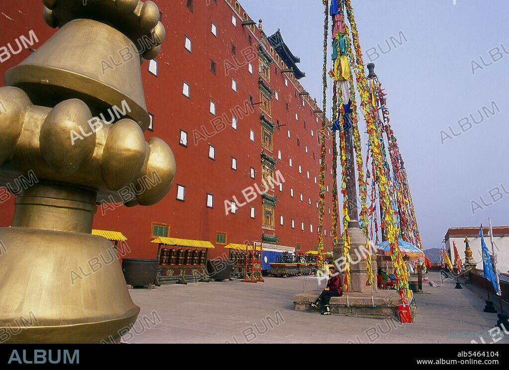 The Putuo Zongcheng Temple is a Qing Dynasty era Buddhist temple complex built between 1767 and 1771, during the reign of the Qianlong Emperor (1735–1796). The temple was modeled after the Potala Palace of Tibet, the old sanctuary of the Dalai Lama built a century earlier. In 1703, Chengde was chosen by the Kangxi Emperor as the location for his summer residence. Constructed throughout the eighteenth century, the Mountain Resort was used by both the Yongzheng and Qianlong emperors. The site is currently a UNESCO World Heritage Site. Since the seat of government followed the emperor, Chengde was a political center of the Chinese empire during these times. Chengde, formerly known as Jehol, reached its height under the Qianlong Emperor 1735-1796 (died 1799). The great monastery temple of the Potala, loosely based on the famous Potala in Lhasa, was completed after just four years of work in 1771. It was heavily decorated with gold and the emperor worshipped in the Golden Pavilion. In the temple itself was a bronze-gilt statue of Tsongkhapa, the Reformer of the Gelugpa sect.