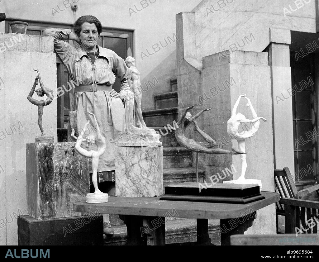 A new series of photographs of Lady Hilton Young at work in her studio in Bayswater . Lady Hilton Young was the widow of Captain Robert Falcon Scott, the antarctic explorer. 26 March 1931.