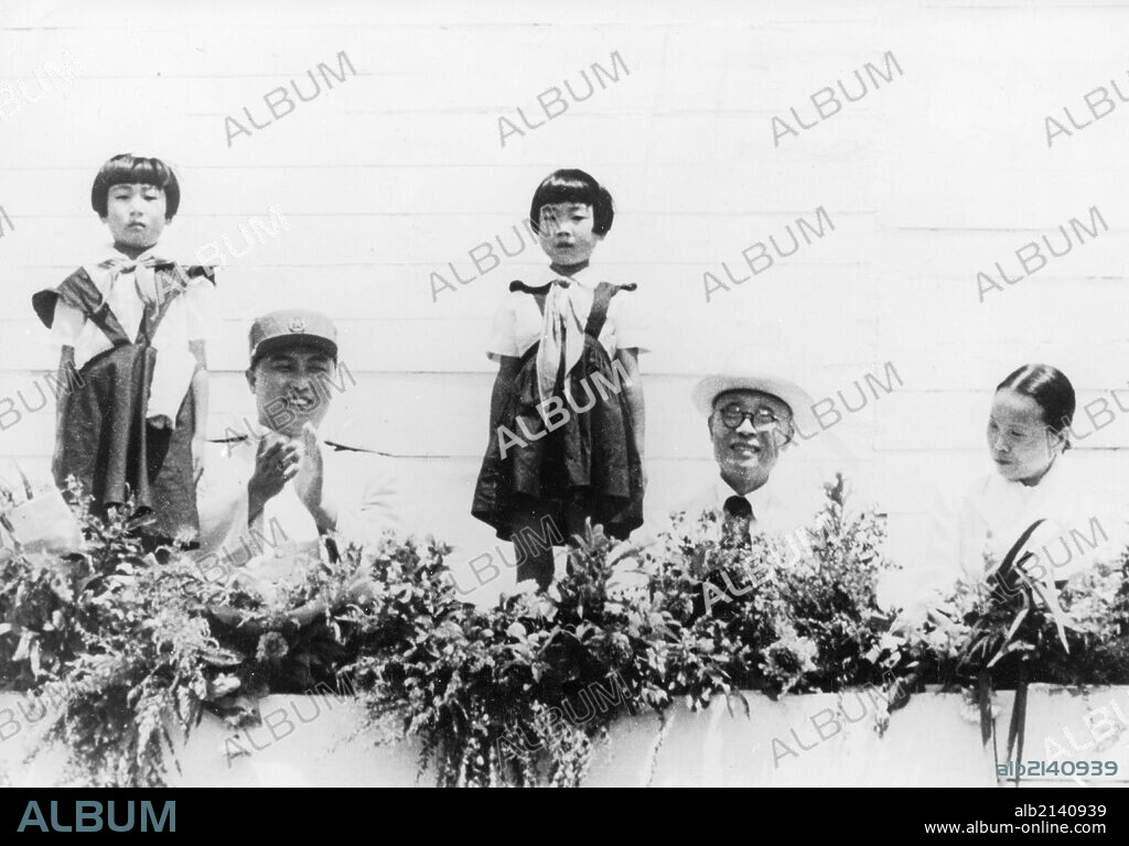 Marshal Kim Il Sung; Kim Du Bong, President of the Standing Committee of the Supreme People's Assembly; and Bak Cheng Ai, Secretary of the Central Committee of the Nodong Dang during armistice celebrations in Pyongyang. July 28, 1953. (Photo by: Sovfoto/UIG via Getty Images).