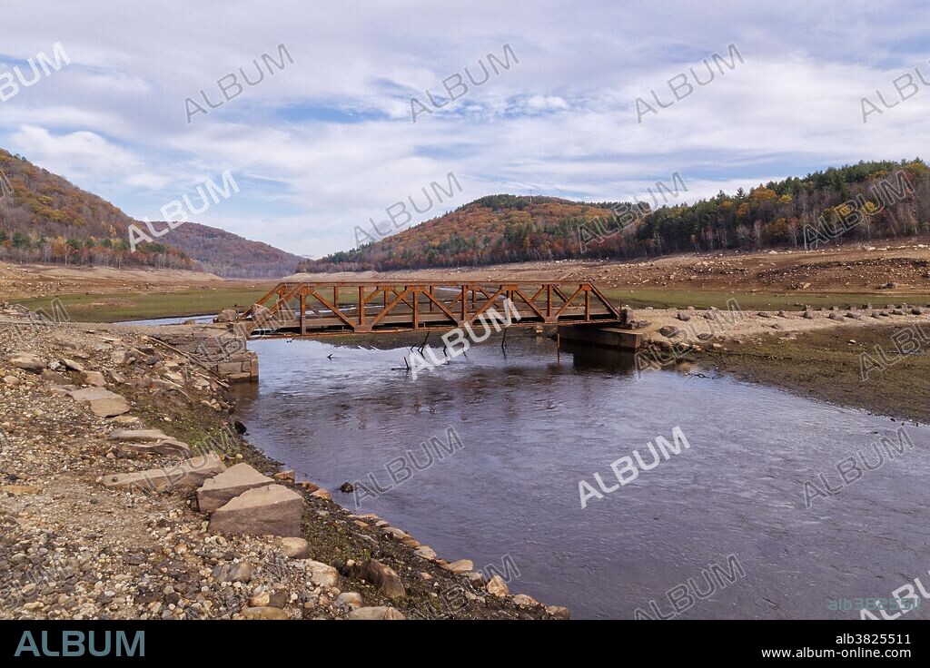 Colebrook Reservoir in northern Connecticut in October 2016. This iron bridge has been under water for about 60 years but the drought has exposed it for the first time since. Connecticut. USA.