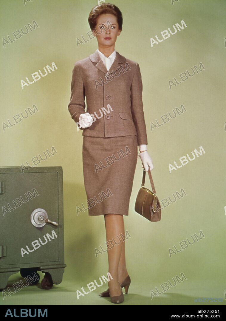 TIPPI HEDREN in MARNIE, 1964, directed by ALFRED HITCHCOCK. Copyright UNIVERSAL PICTURES. Custome by Edith Head.